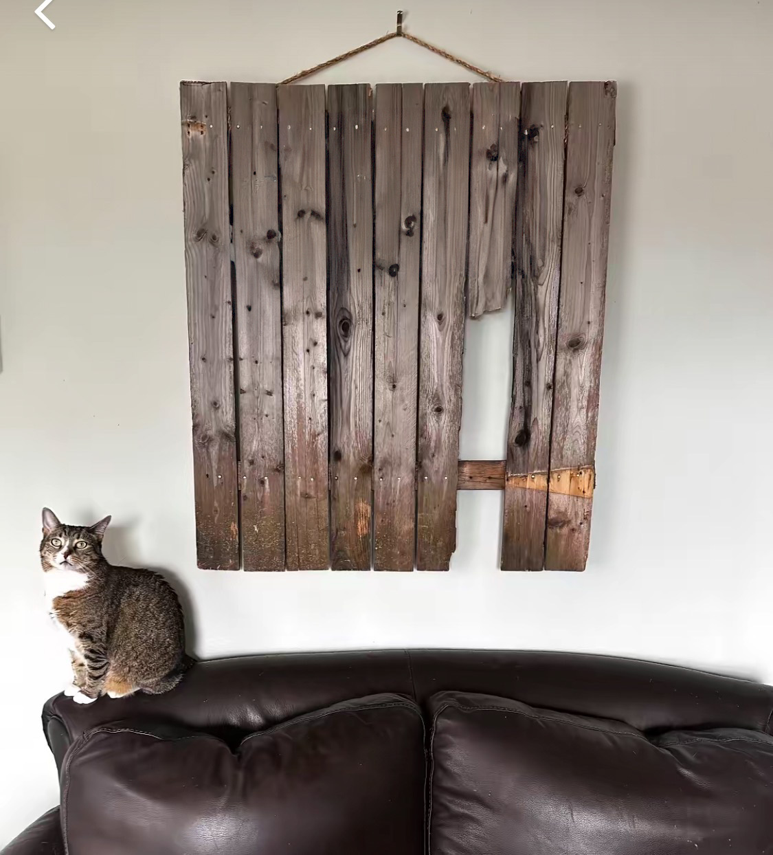 The fence preserved as art on the wall